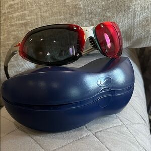 Nike Silver Frame Sunglasses with Red Gradient Lenses